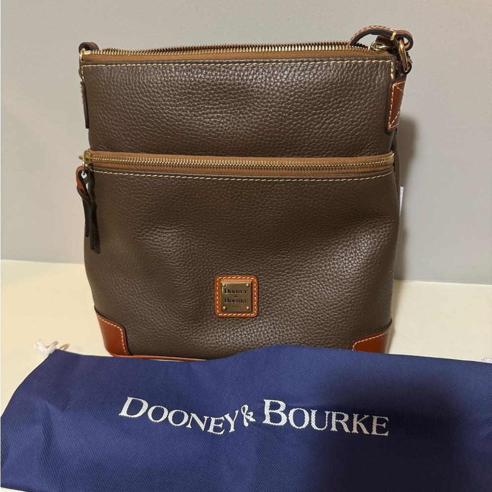 Dooney and Bourke crossbody bag. New with tags and dust bag.
